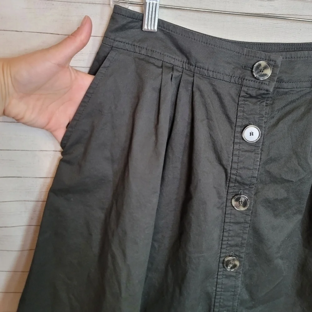 TRINK TURK A LINE BUTTON FRONT BLACK PLEATED SKIRT, SZ 12